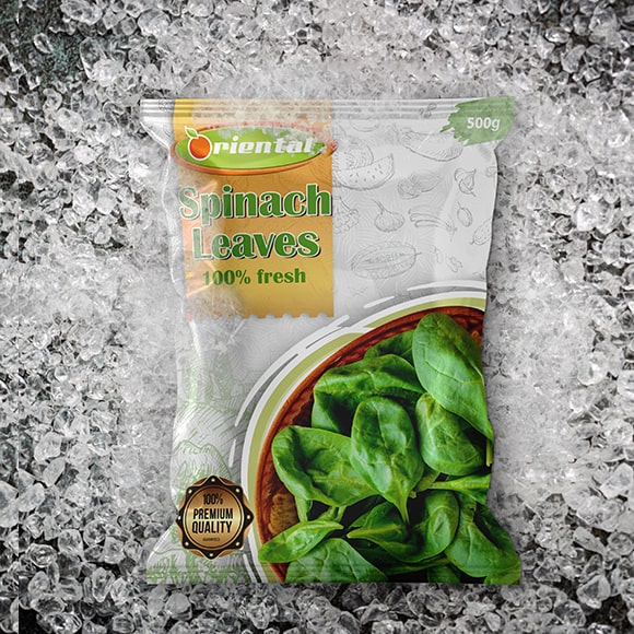 frozen Spinach Leaves with ice cubes background