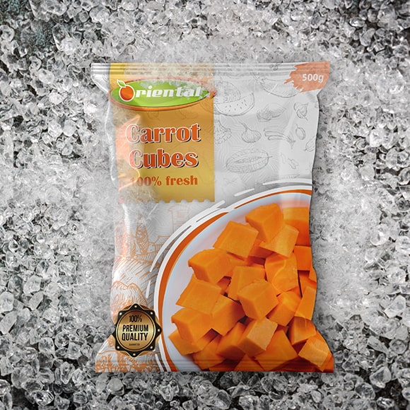frozen Chopped carrot with ice cubes background