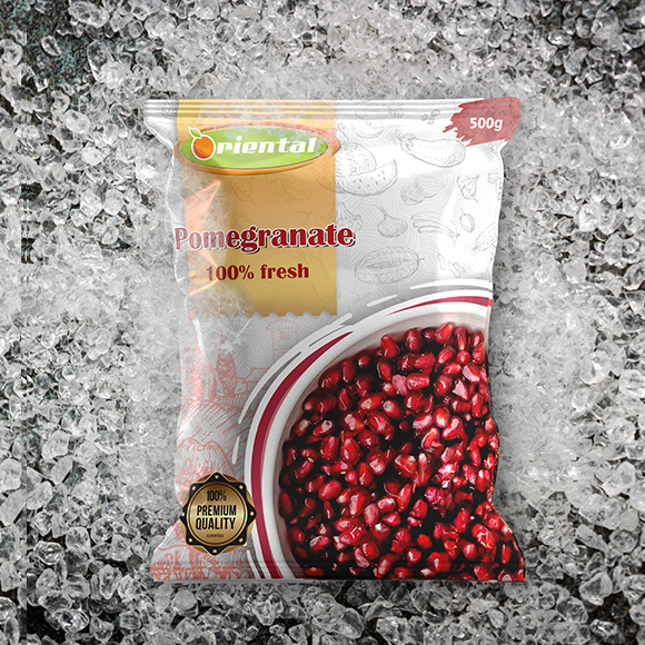 frozen Pomegrante with ice cubes background